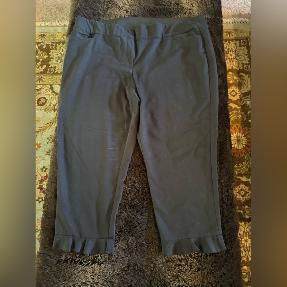 Lane Bryant black cropped slacks with ruffle edge.